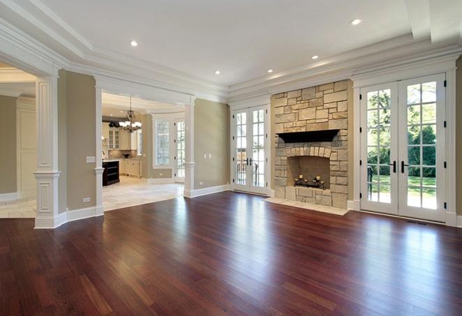 sunlit bedroom with elegant wood flooring